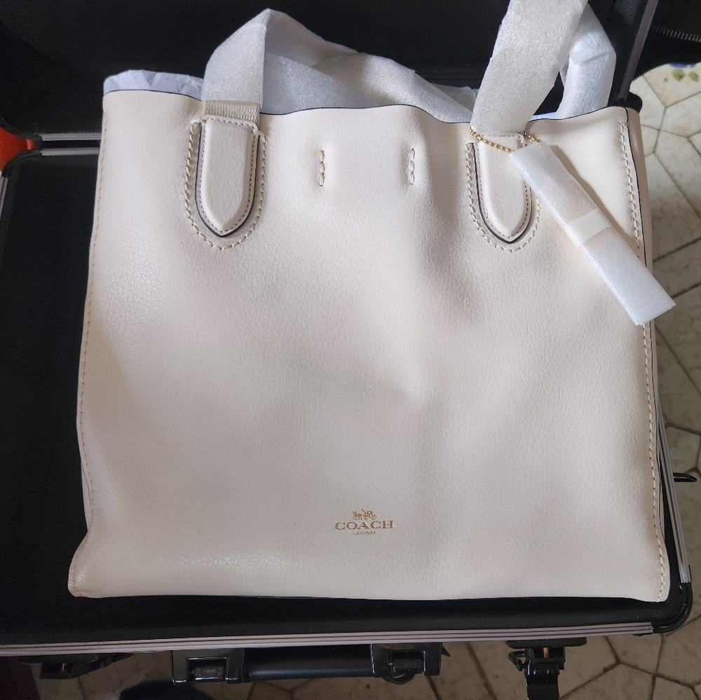 Brand new Coach bag and wallet.